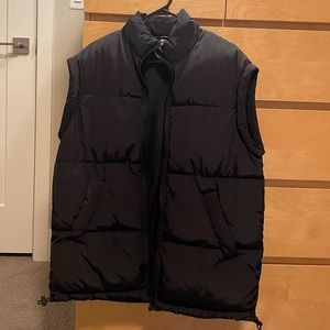 Oversized black puffer vest